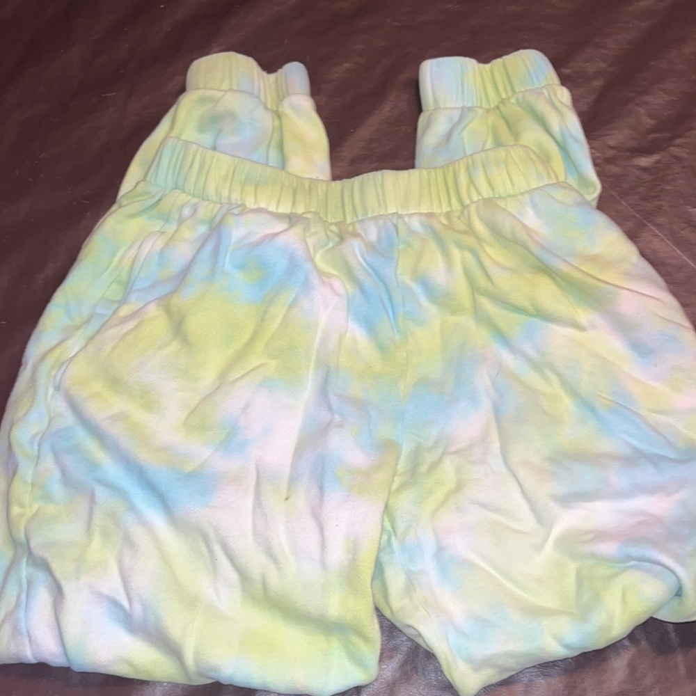 Green white and blue sweatpants from target(not cropped like the thing says)